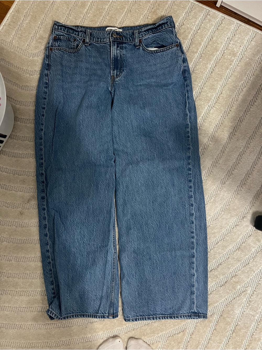 Abercrombie & Fitch Women's Low-Rise Ultra Loose Curve Love Jeans.